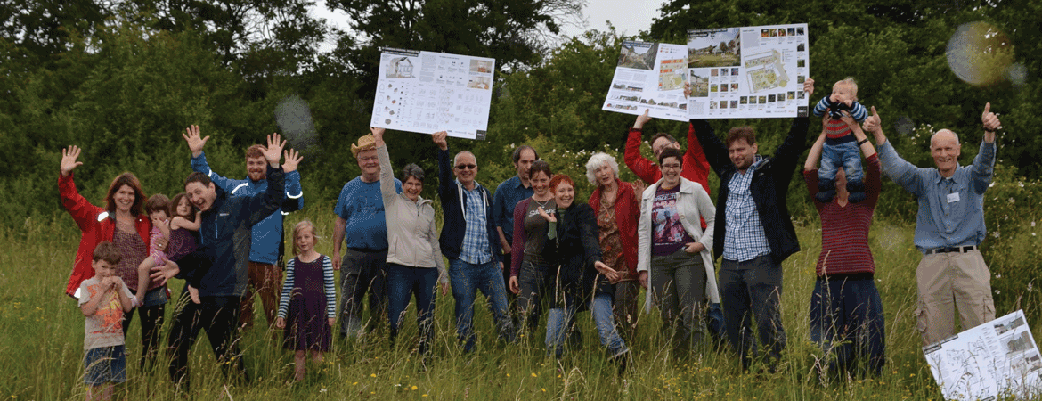 Photo of members of Cambridge Cohousing standing on the K1 site