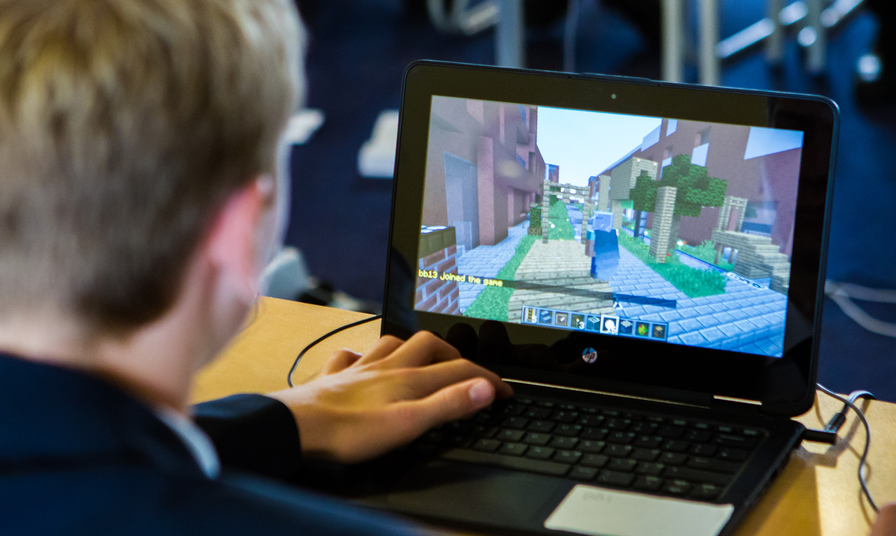 boy at computer at Love Wolverton block builders minecraft workshop