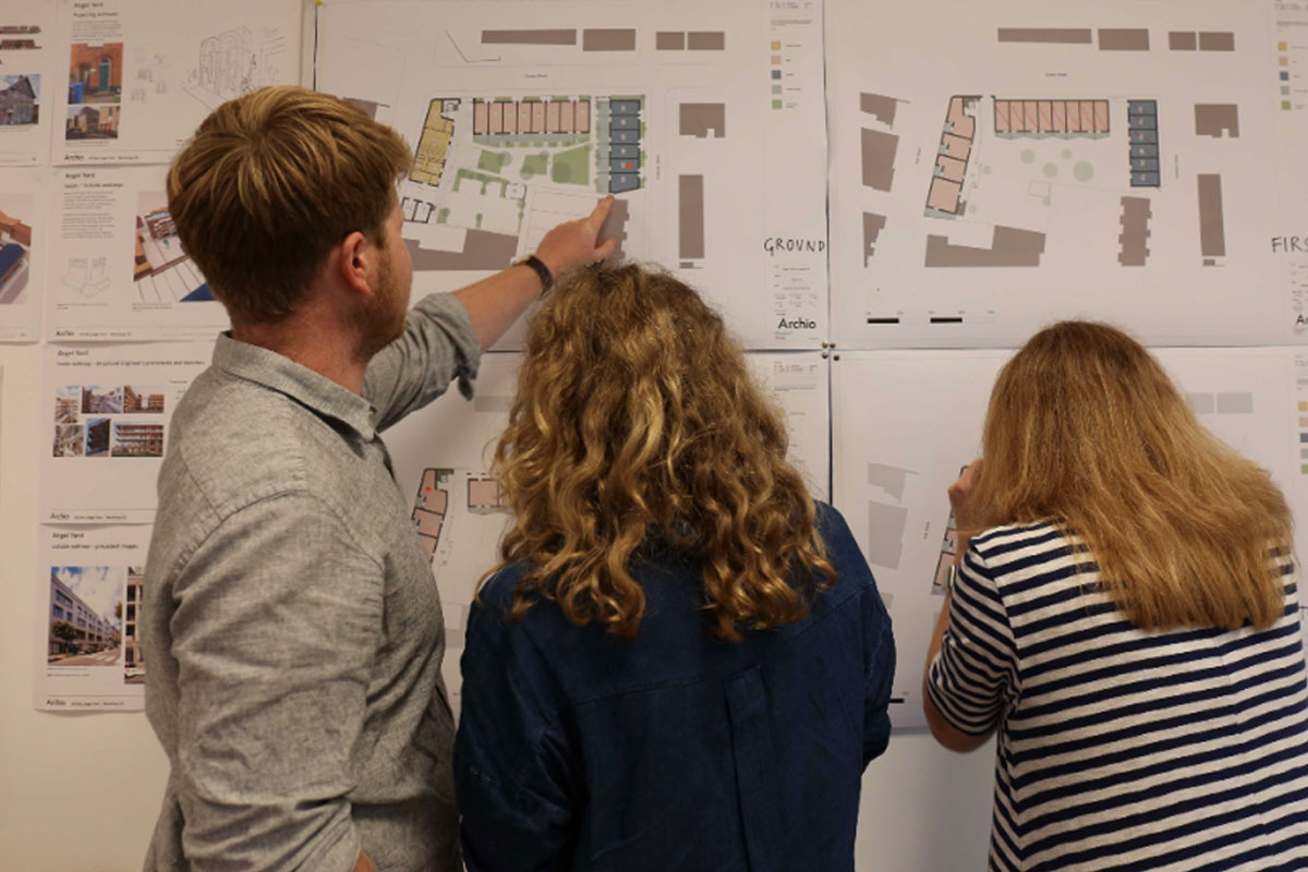 Angel Yard cohousing members review plans at a recent design workshop